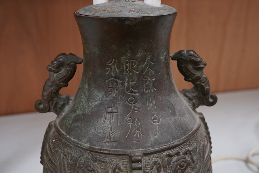 A Chinese archaistic bronze vase mounted as a table lamp, 62cm total
